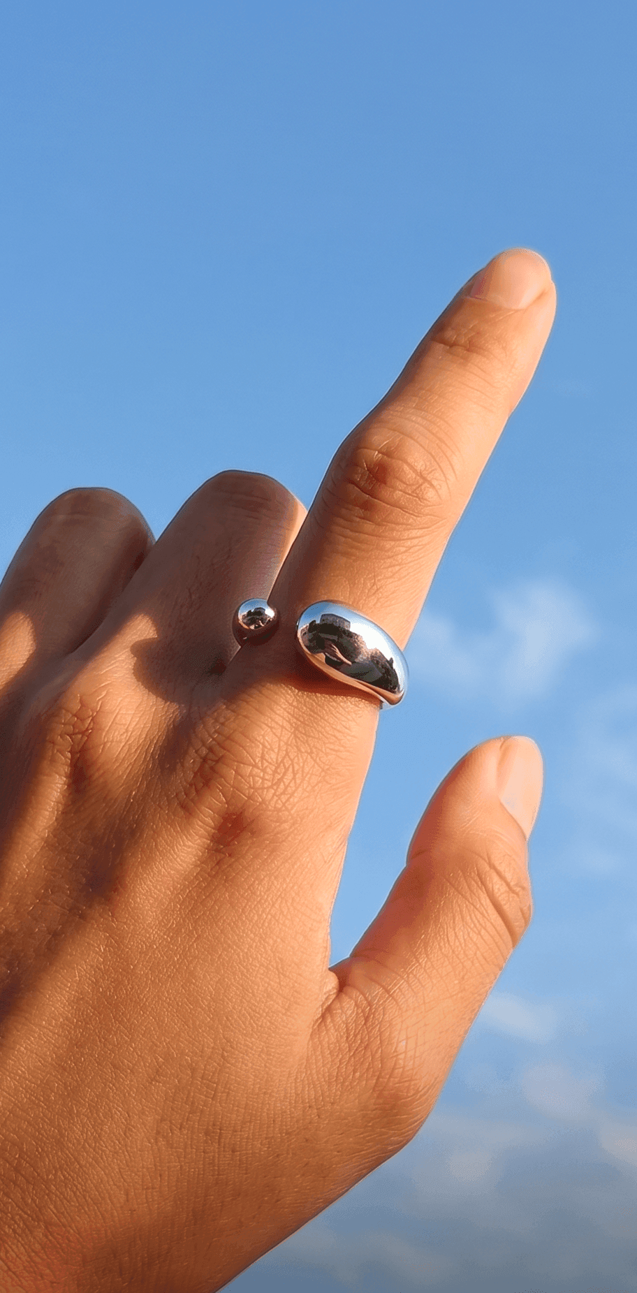 Hand wearing the KittyFx ring